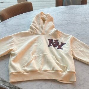 Urban Outfitters Cream Hoodie with NY Patch